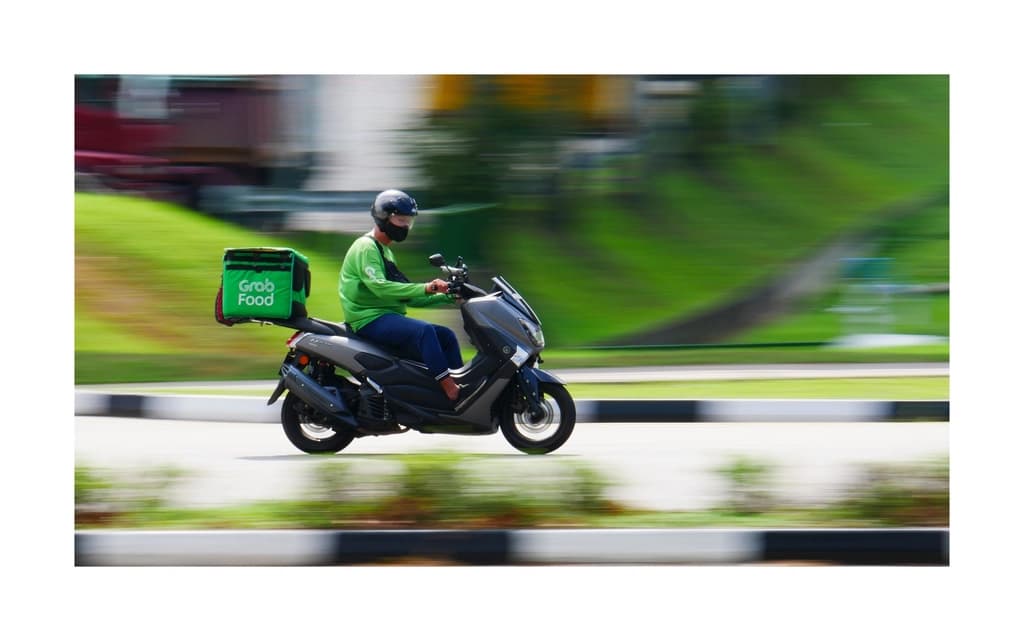 Grab food delivery man. 30